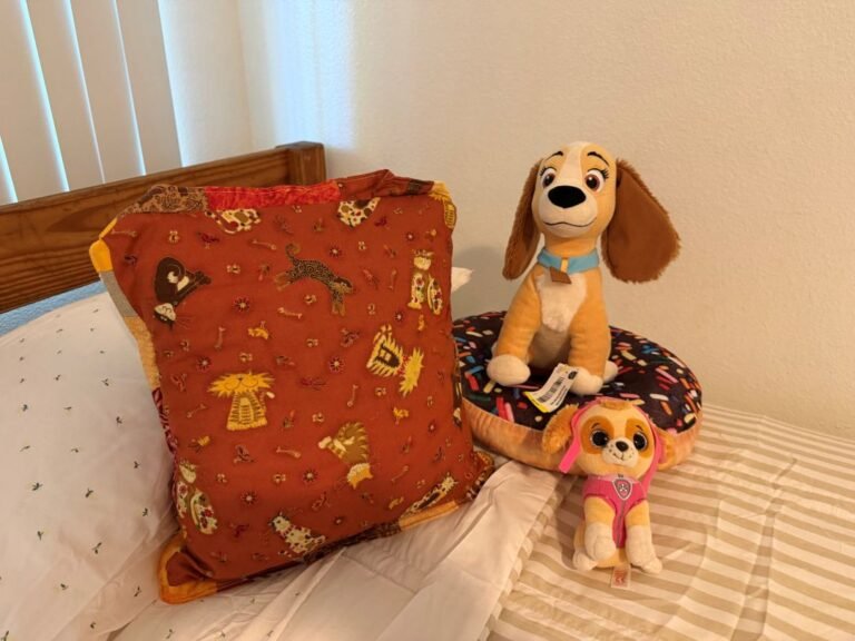kid bed with plushies & pillow